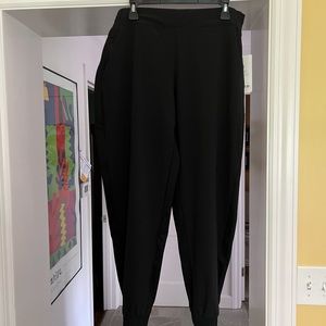 Athleta Brooklyn Jogger. Very flattering due to slash pockets and tuxedo stripe